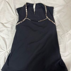 Black lululemon tank NWT
Never been worn, size 6 . Still has tags , stretchy